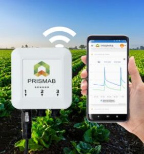 Transmisor Link de Prismab junto a la app en el móvil